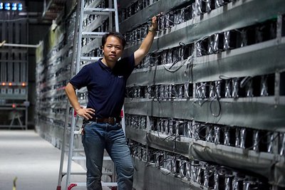 A vast bitcoin mining farm with rows of mining machines operating in a temperature-controlled environment