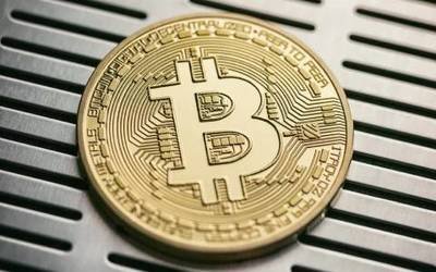 A powerful ASIC miner processing complex calculations to secure the Bitcoin network.